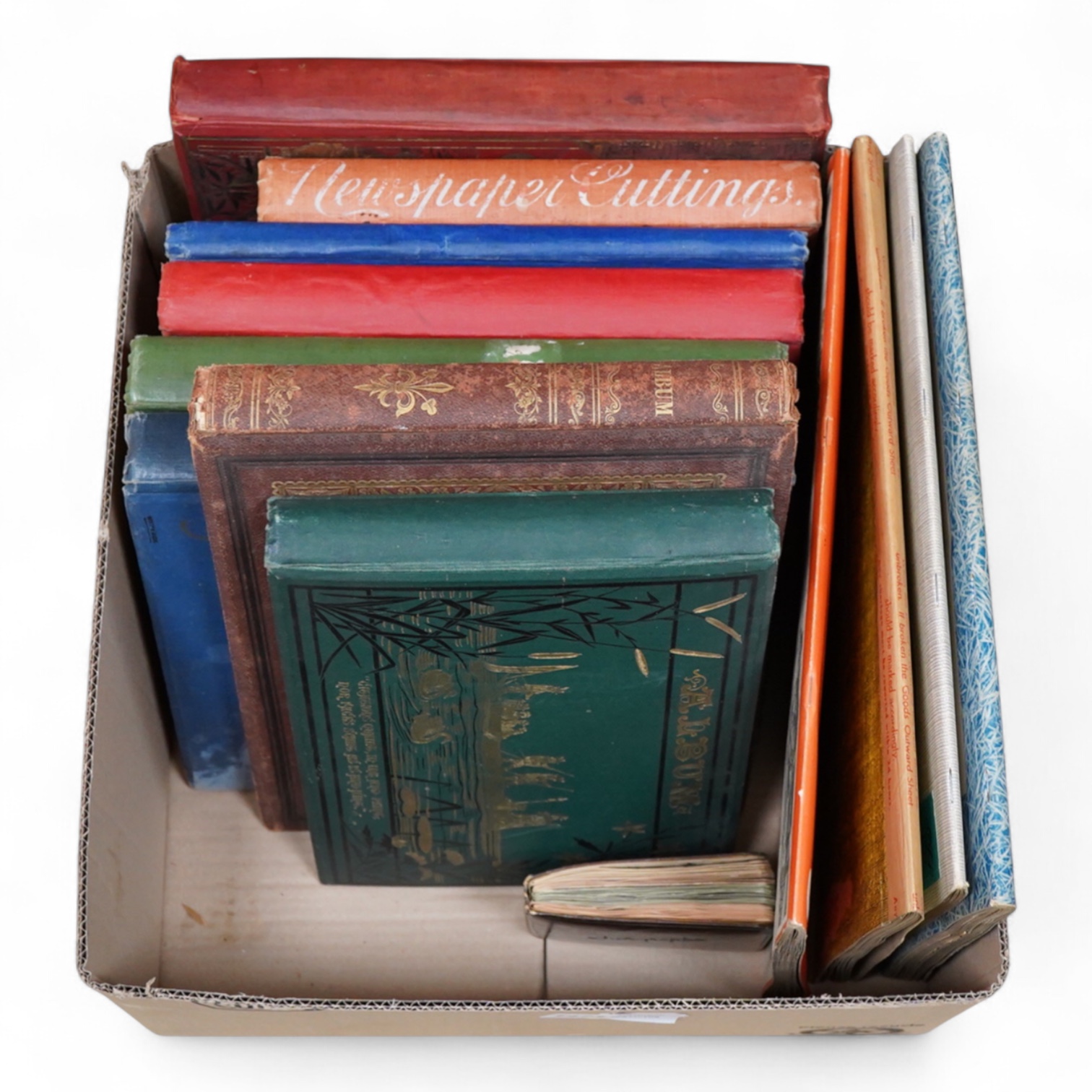 A collection of Victorian and later scrap books containing decoupage, newspaper cuttings and cutout prints
